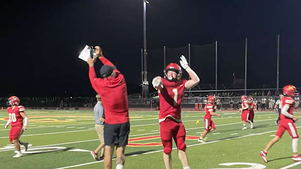 Chico coach high fives player justin couchot photo